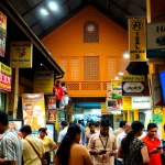 Engaging market scene promoting Hela Add services in Sri Lanka.