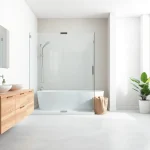 Showcase elegant shower screens for walk in showers in a modern, spacious bathroom setting.